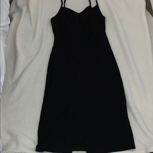 High front slit, faux button, black ribbed bodycon